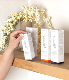 GlyMed Plus pharmaceutical-grade skincare products arranged in a professional skincare studio